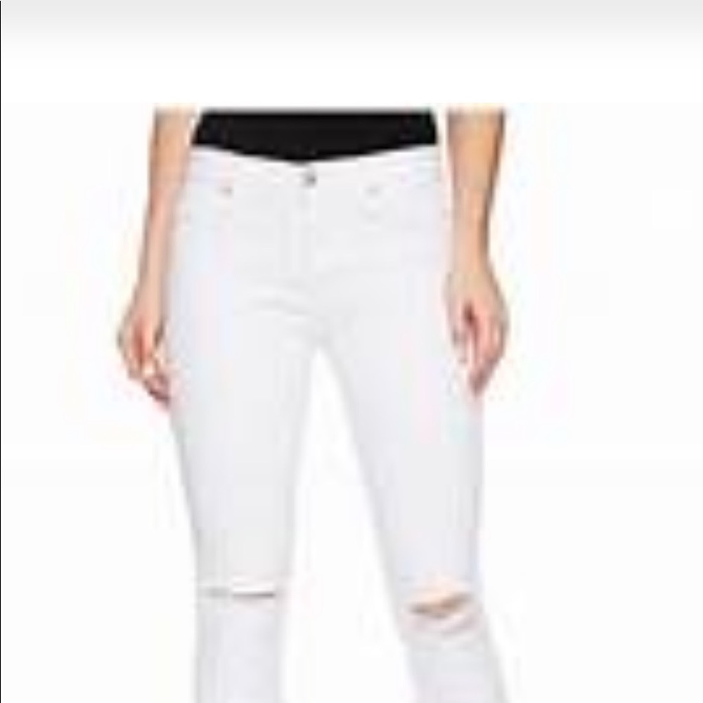 Hudson Nico mid-rise white super skinny ankle jeans.